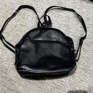 Mini black faux leather backpack